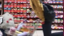 Boy Attempts to Ride a Shopping Cart and Takes a Tumble in the Aisle