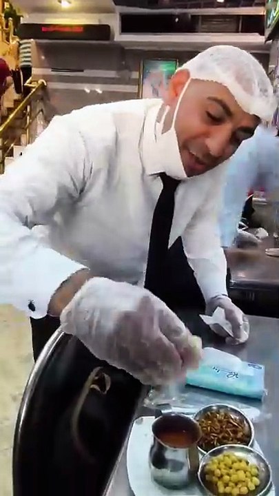 Eating Koshari the national dish of Egypt at Abou Tarek Restaurant in Cairo