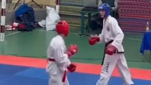 Two Taekwondo athletes meant to fight end up falling together without hitting anyone