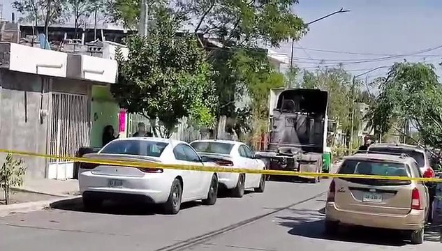 VIDEO | Catean casa en Alianza Real por homicidio de joven; buscan a padre e hijo prófugos