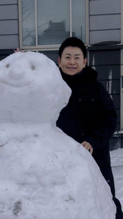 Just as the snowstorm had ended, Nelson Wang, a resident of The Octagon, couldn't wait to go out and play in the snow. On February 23, 2026, on Roosevelt Island in Manhattan.