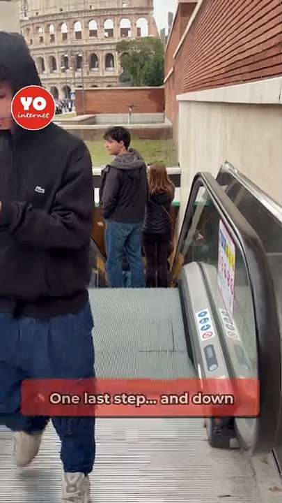Girl Trips on Escalator While Recording Colosseum in Rome