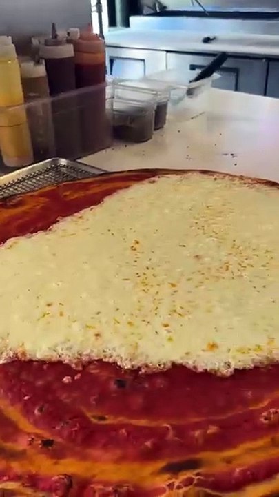 Quadruple cheese slice coming out of the oven 😮‍💨