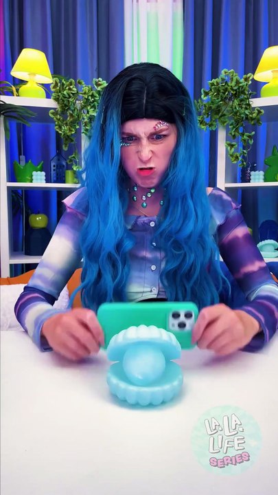 Weird Gadget Alert! 🖐️📱 You Have to See This Phone Holder!