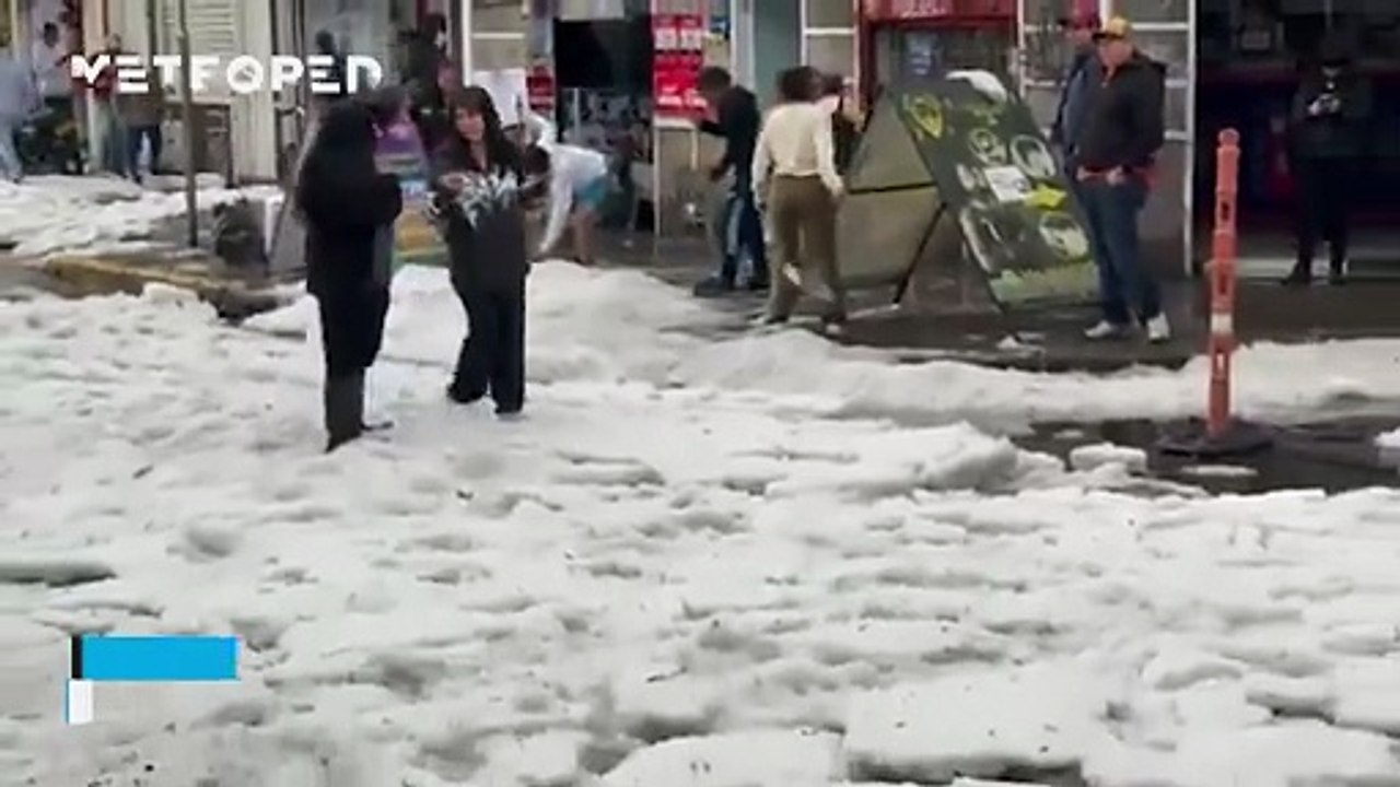 A massive hailstorm blankets the streets of Bog...