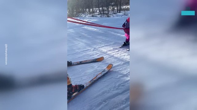Toddler Falls Asleep While Skiing With Parents
