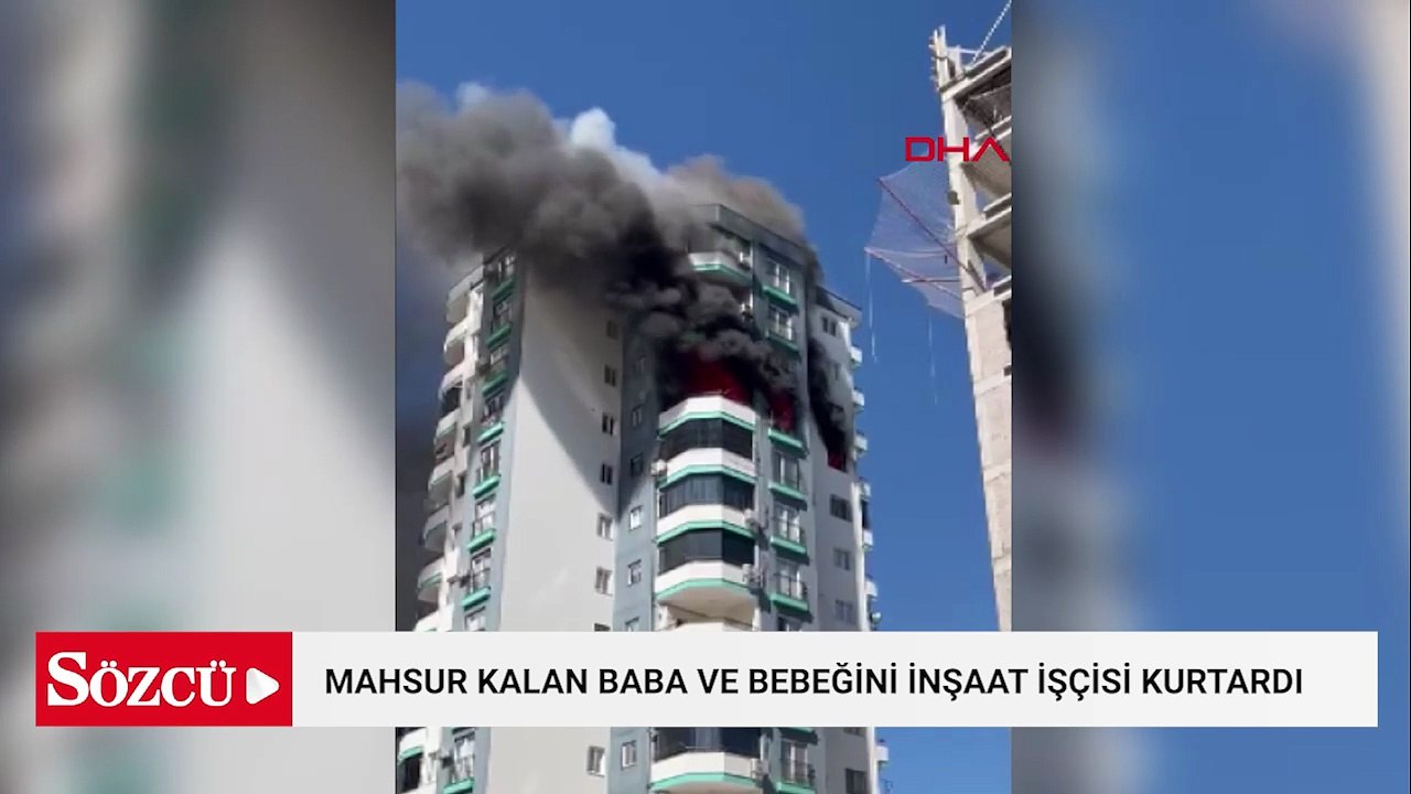 Apartmanda çıkan yangında mahsur kalan baba ve bebeğini inşaat işçisi kurtardı