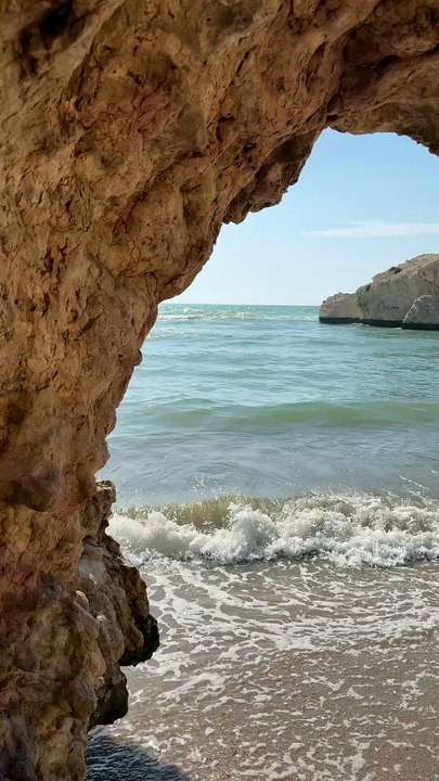 Serene Ocean View Through Rocky Cave