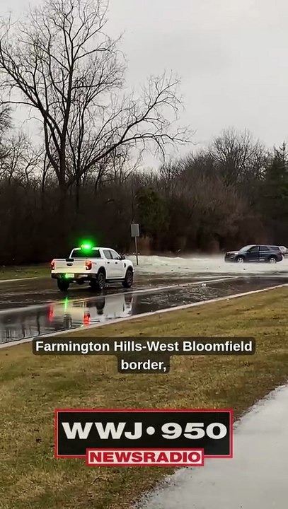 Flooding over 14 Mile Road from massive water main break