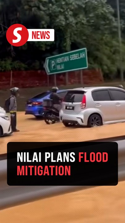 Nilai floods trap vehicles; flood prevention measures underway