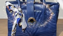 Sapphire Crest Leather Satchel