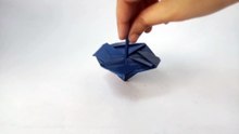 Turning a blue paper into a spinning top 🔵✨ Origami creativity at its best.