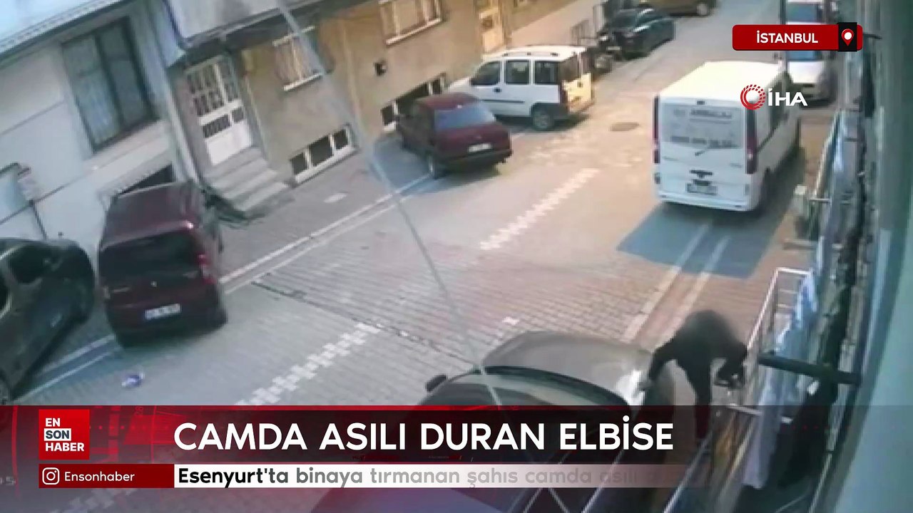 İstanbul'da binaya tırmanan şahıs camda asılı duran elbiseleri çaldı