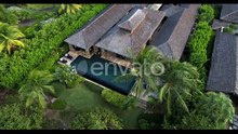 Aerial View of Luxury Villa With Private Swimming Pool in Green Tropical Lush of Exotic Island