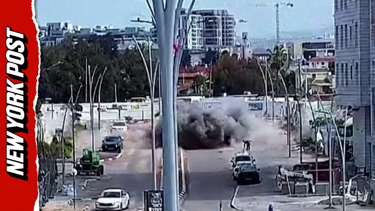 Shocking CCTV shows Iranian missile strike Israeli road