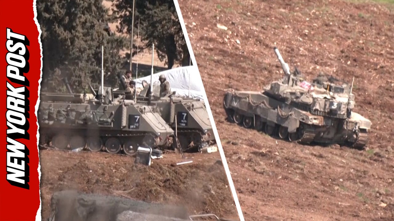 Israeli military gathers armored vehicles near the Israel-Lebanon border