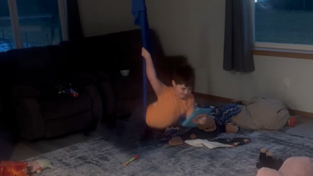 Nonverbal autistic child opts for an indoor swing for comfort and fun