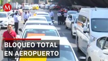 Caos total en el AICM: Taxistas bloquean acceso a la Terminal 1
