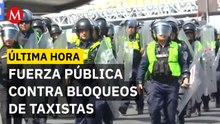 Fuerza Pública interviene tras bloqueo de taxistas en terminales 1 y 2 del AICM
