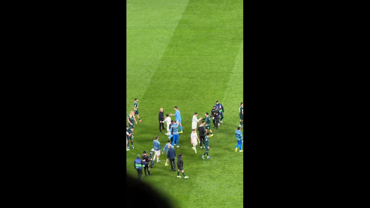 Guardiola greets Madrid squad after loss