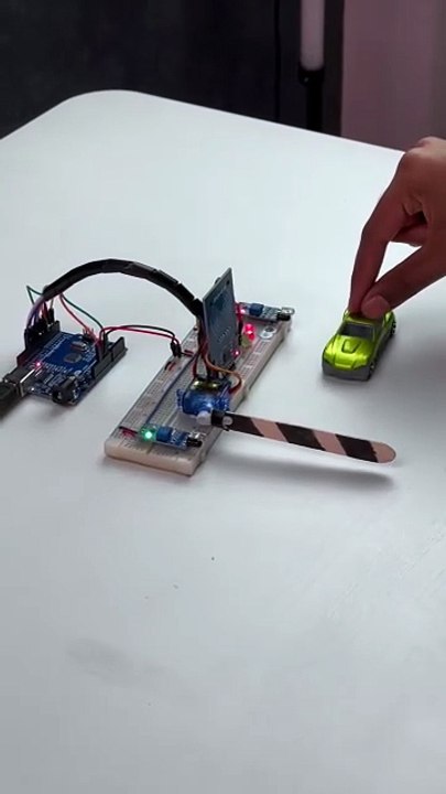 Arduino-Based Automatic Toll Gate System with RFID Authentication