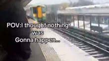 Unexpected moment as a train glides over an umbrella & causes sparks
