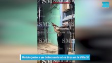 Motolo junto a un delincuente a los tiros en la Villa 31