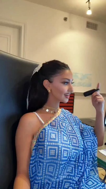 She is showing something