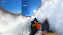 Snowboarder Falls Into Crack While Riding Downhill