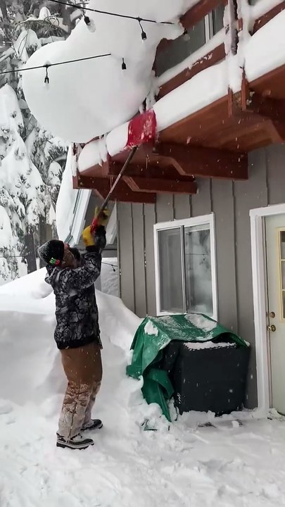 Snow Shoveling Fail under a Massive Roof Avalanche