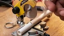 Mini Miter Saw Tool cutting through a small white PVC pipe #diytools #tools #diytool #wood
