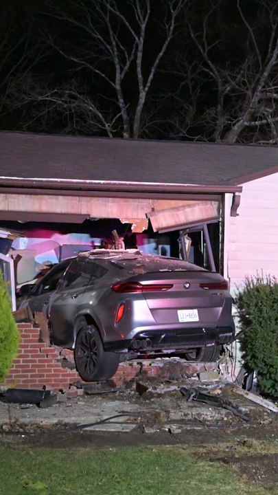 Drunk driver plows car through house