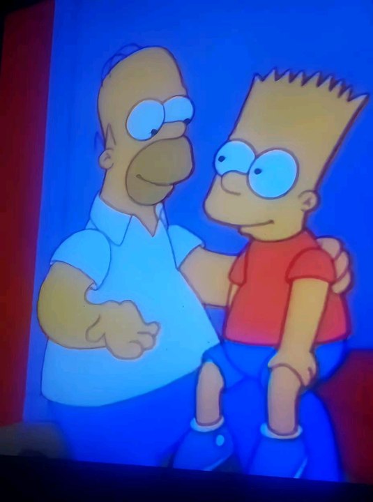Homer and Bart Simpson are Hugging together how cute Father and Son/The Simpsons