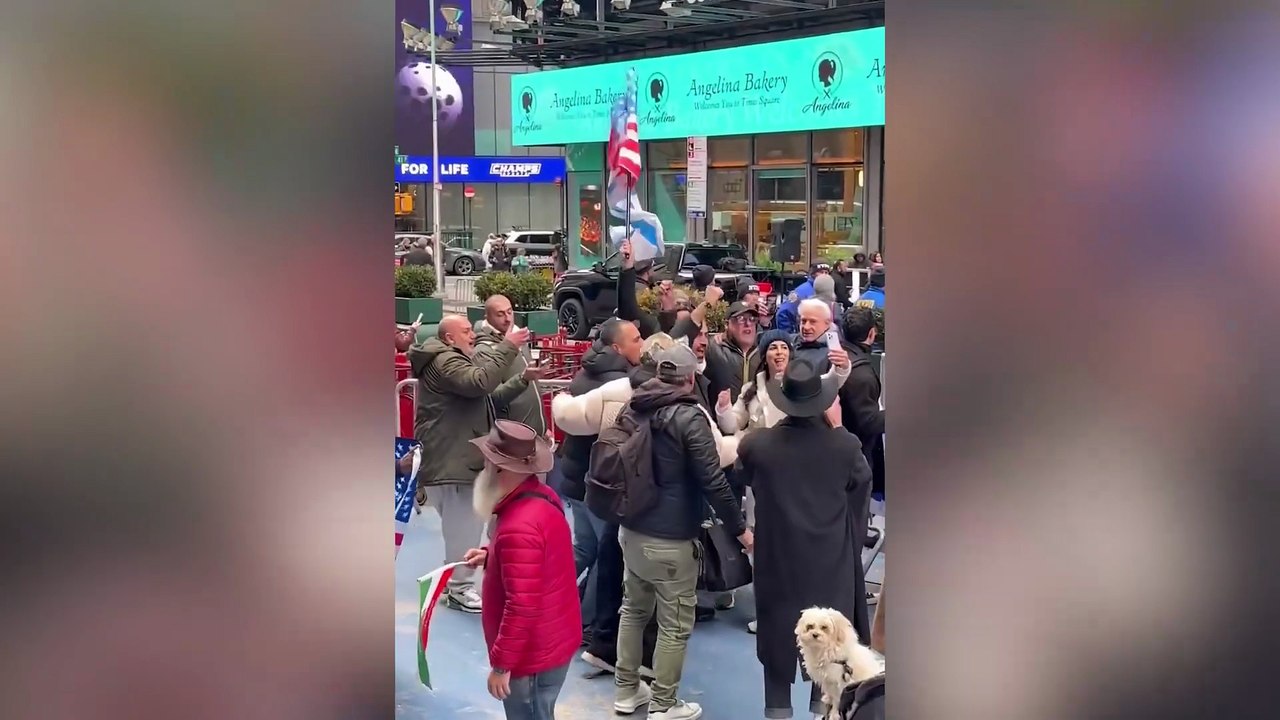 Tensions rise at dueling rallies in Times Square