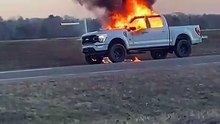 Gripping footage of abandoned Ford truck burning fiercely on the roadside