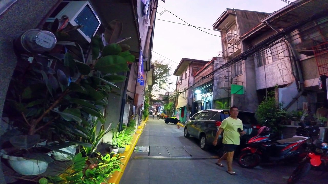 Cheerful Feeling on Adelina Street in Manila City in the Philippines