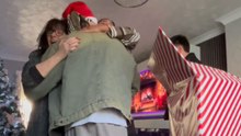 Man unexpectedly returns home after 8 months by popping out of Christmas present box