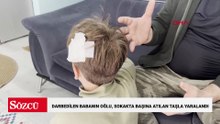 Kucağında bebeği ile darbedilen babanın oğlu, sokakta başına atılan taşla yaralandı