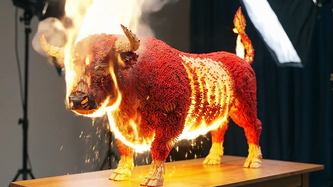 Matchstick Bull Engulfed in Flames – Epic Burning Sculpture Melts Live!