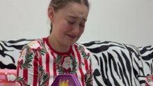 Young girl breaks down in tears after receiving iPhone 17 on Christmas
