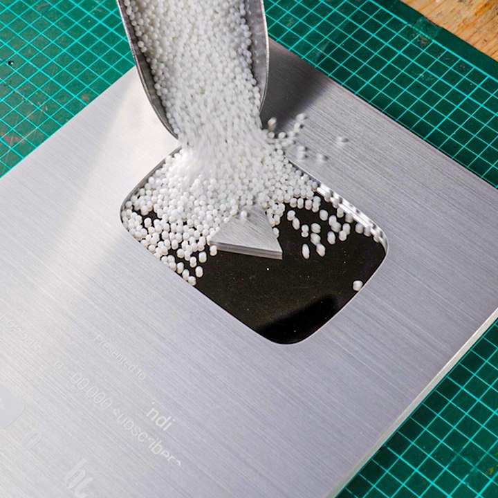 She filled her Youtube Play Button with Melted Plastic 🔴🔥