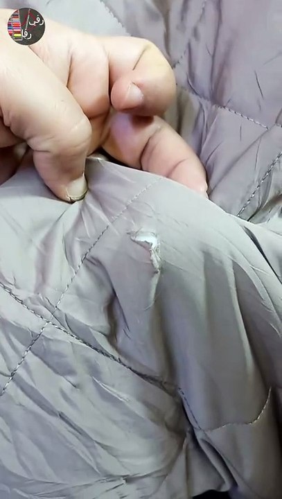 Repairing a hole in a jacket the right way.