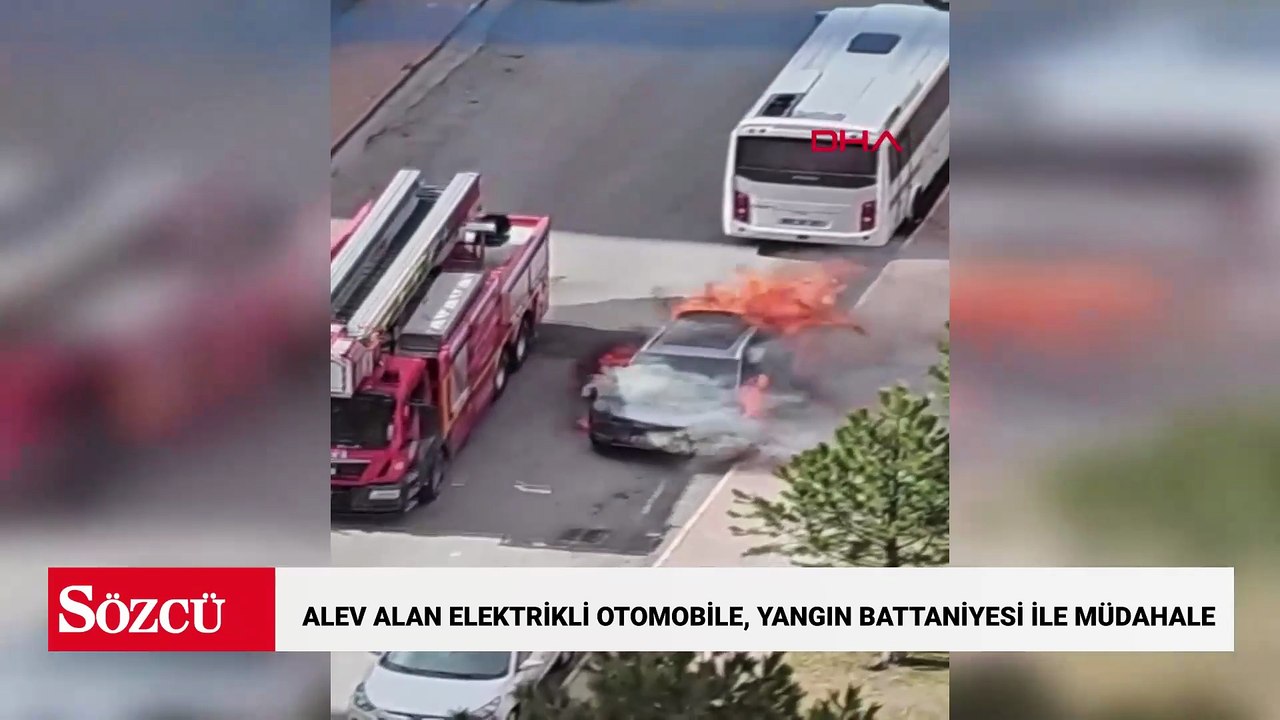 Alev alan elektrikli otomobile, yangın battaniyesi ile müdahale