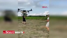 Tarım dronuna tutunan çiftçinin düştüğü anlar kamerada