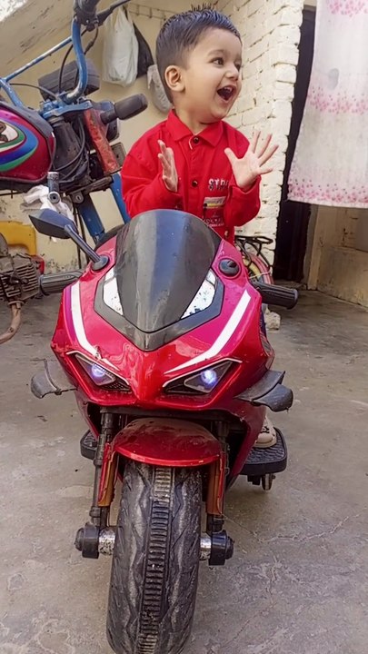 Salar ahmad playing with heavy bike