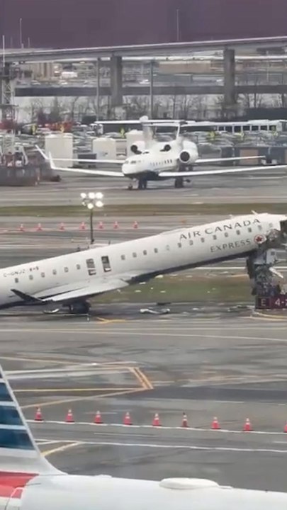 Traveler films damage after LaGuardia plane crash