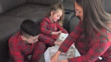 Mom shares endearing footage of her kids being surprised with a new puppy on Christmas Eve