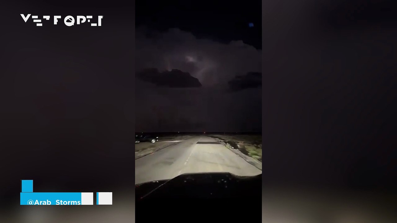 A massive nighttime thunderstorm lights up the desert in Qatar