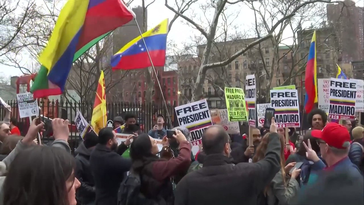 Maduro supporters and critics protest outside court during his trial