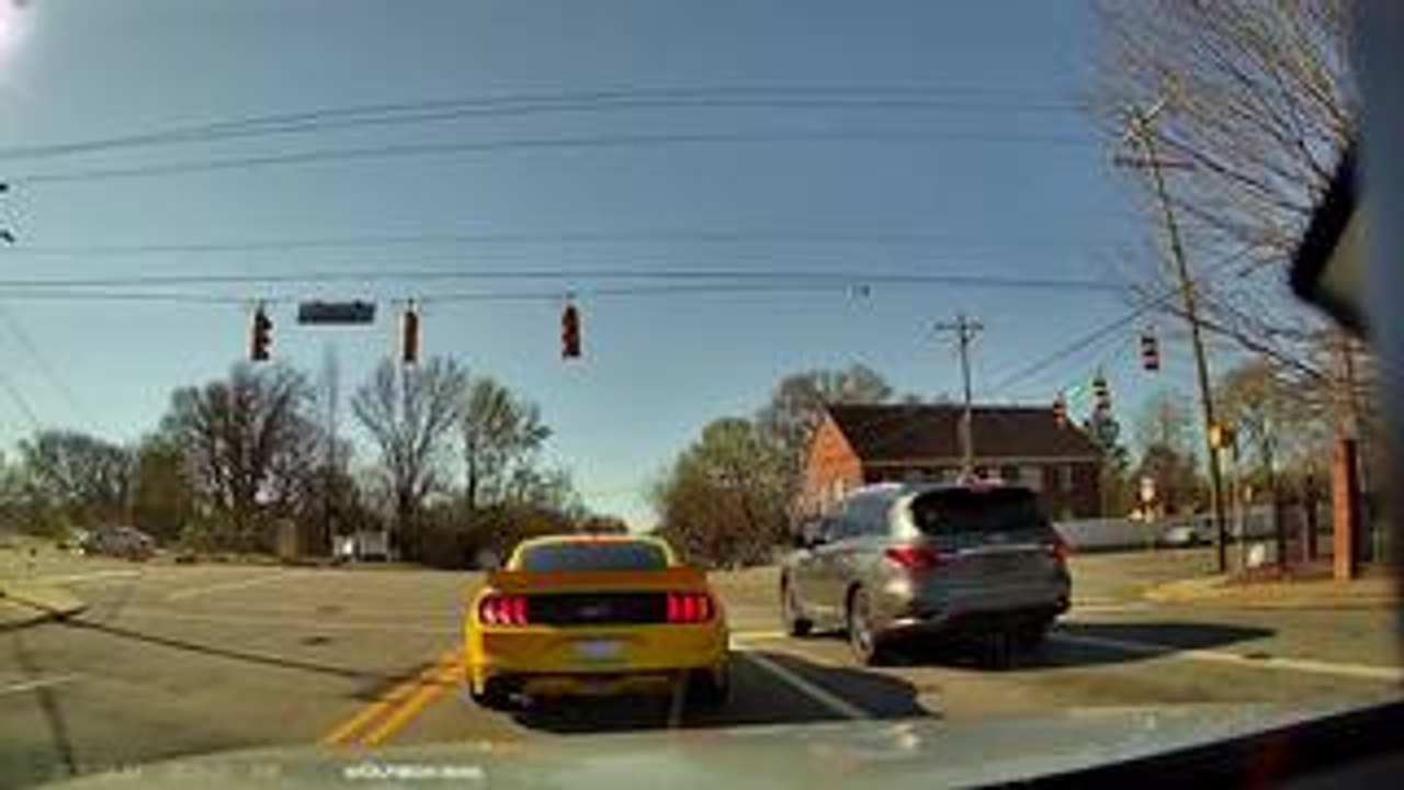 Car Crashes Into Pole At Intersection